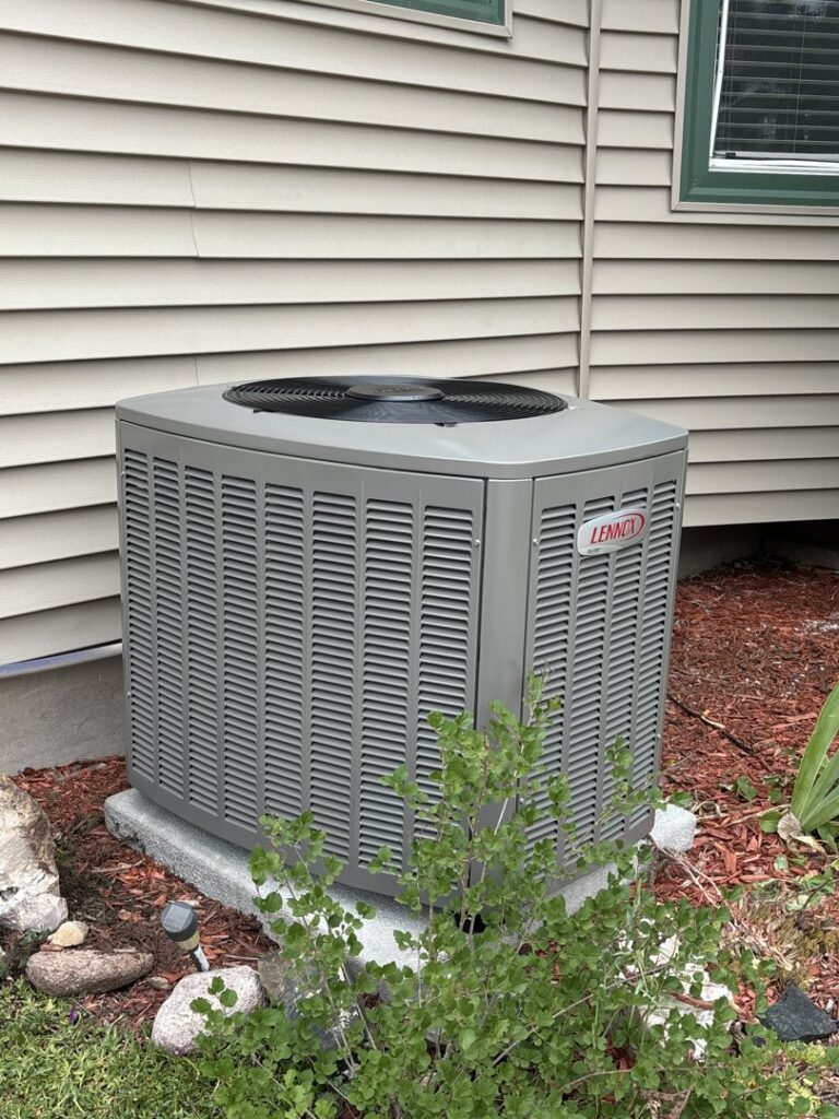 A Lennox AC condenser unit installed by Advanced Comfort Solutions, Inc. in Cheyenne, WY.