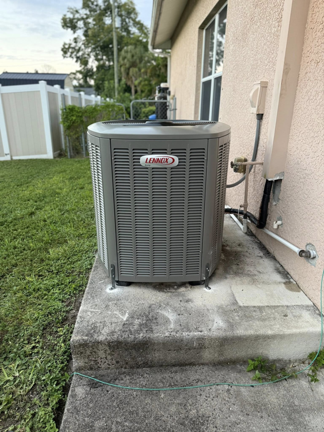 A Lennox AC condenser unit installed by NextGen Aire of Southwest Florida in Punta Gorda, FL.