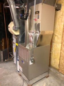 A Lennox and Carrier HVAC system installation with ductwork and piping by Arrowhead Mechanical HVAC in Woodville, OH