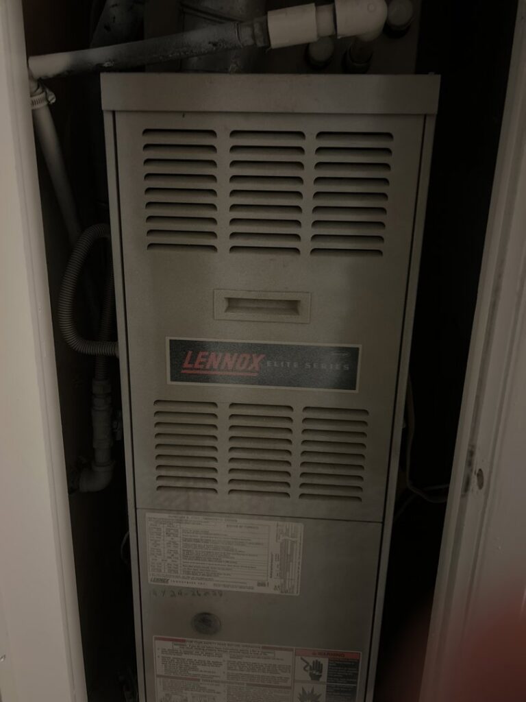 A Lennox Elite Series furnace and air handler unit installed by Air Fix in Fayetteville, AR.