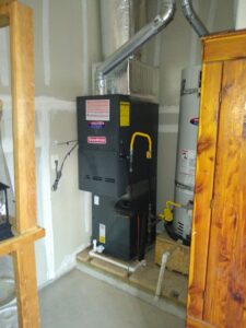 A Lennox furnace and air handler unit installed in a modern alcove by Nevada Heating in Sparks, NV.