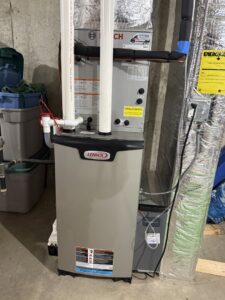 A Lennox furnace and air handler system with ductwork installed by Revolution HVAC in Owings Mills, MD.