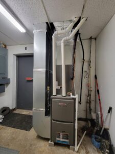 A Lennox furnace and associated ductwork installed by Trade Allies Heating and Cooling in Ankeny, IA.