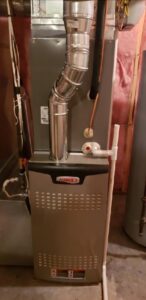 A Lennox furnace and associated ductwork installed in a basement by Preferred Heating & Air in Bismarck, ND.