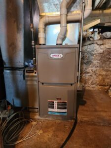 A Lennox furnace with a Honeywell air filter system installed by Heating and Cooling Drs of Waukesha, Pewaukee, and Delafield, Waukesha, WI.
