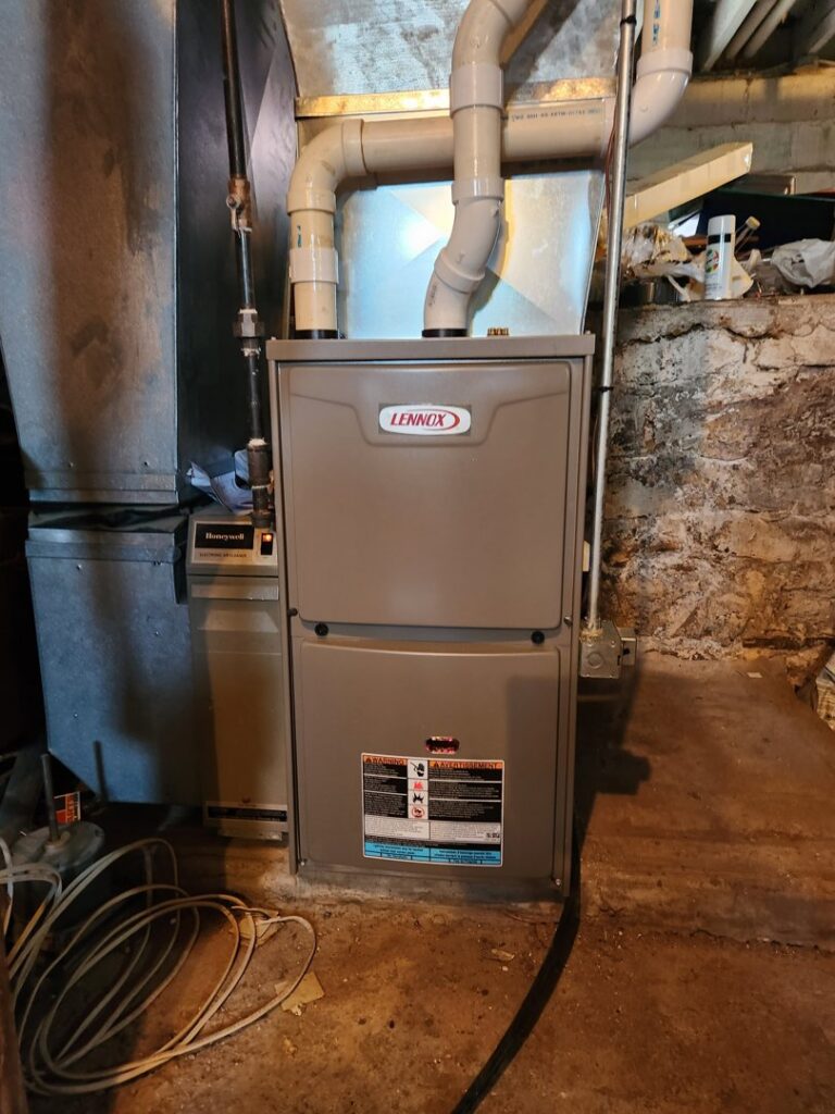 A Lennox furnace with a Honeywell air filter system installed by Heating and Cooling Drs of Waukesha, Pewaukee, and Delafield, Waukesha, WI.