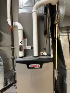 A newly installed Lennox furnace and ductwork, showcasing HVAC installation by All Comfort Services in Madison, WI