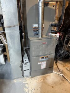 A newly installed Lennox furnace and air handler unit with ductwork by Crain Heating and Cooling in Jeffersonville, IN.