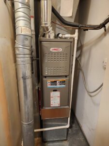 A newly installed Lennox furnace unit with ductwork by Preferred Comfort Heating and Cooling inc in Chicago, IL