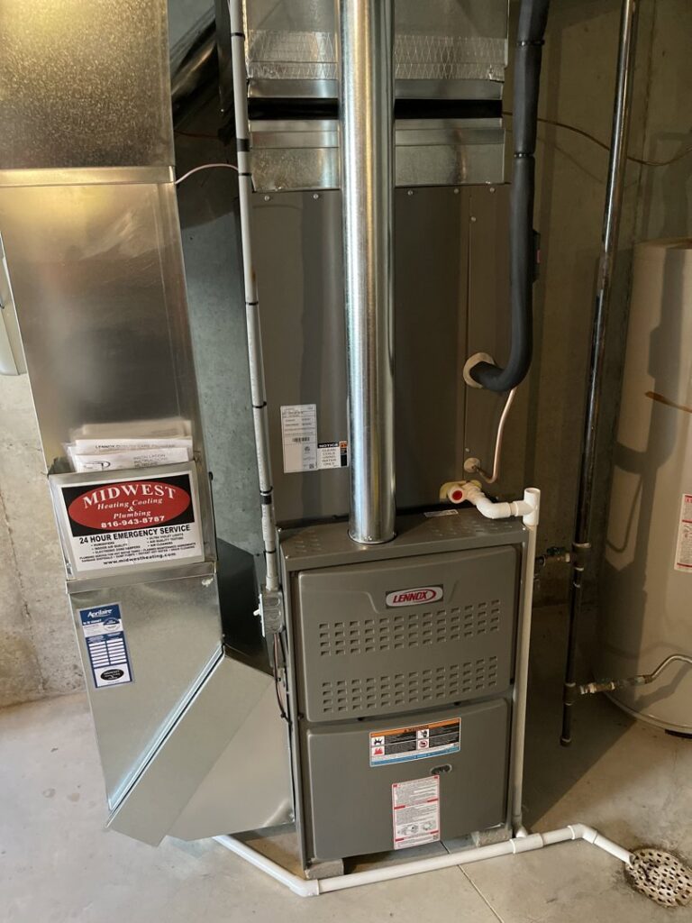 A modern Lennox furnace unit with ductwork installed by Spartan Mechanical KC in Spring Hill, KS.
