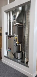 A Lennox furnace unit with ductwork installed in a dedicated alcove by Nevada Heating Reno in Sparks, NV.