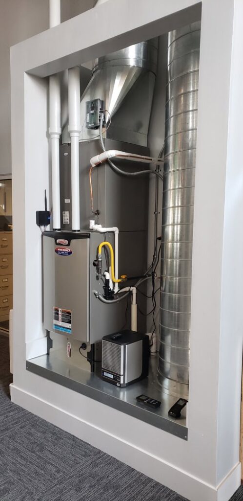 A Lennox furnace unit with ductwork installed in a dedicated alcove by Nevada Heating Reno in Sparks, NV.
