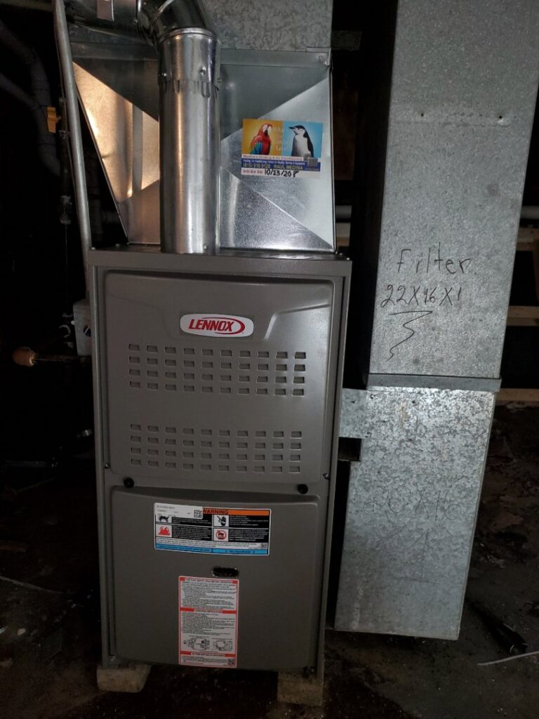 A Lennox furnace with attached ductwork installed by Medina's Heating & Air Conditioning in Joliet, IL.