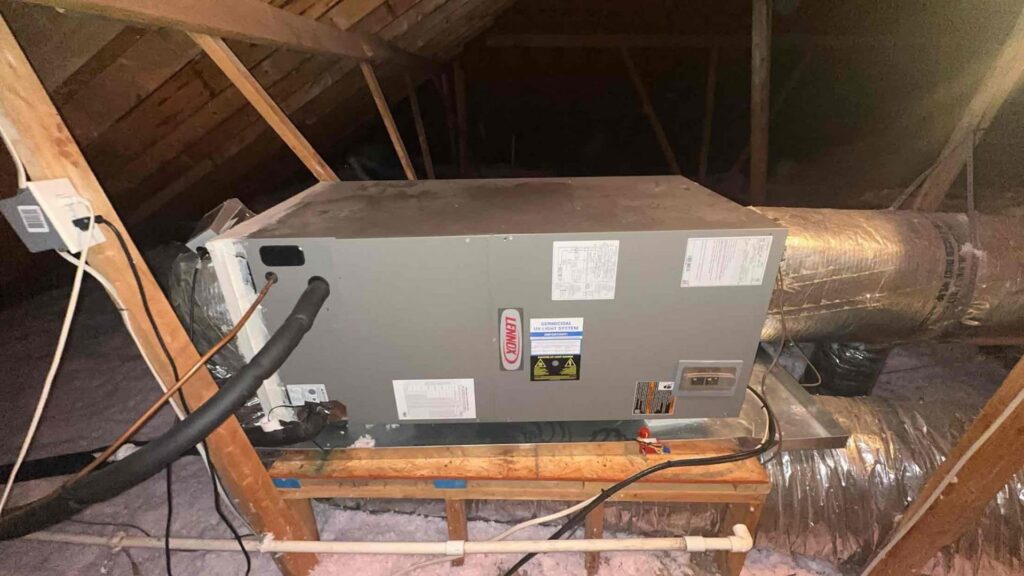 A Lennox HVAC air handler unit installed in an attic by Integrity Services Heating and Cooling in Madison, AL.