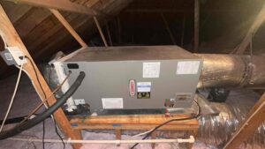 A Lennox HVAC air handler unit installed in an attic by Integrity Services Heating and Cooling in Madison, AL.