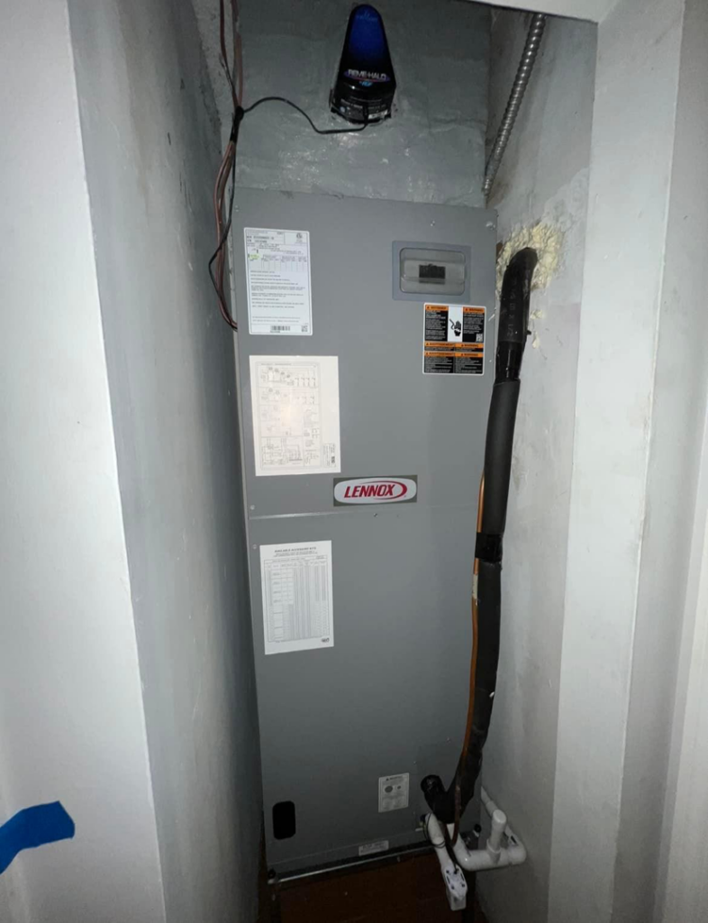 A Lennox indoor air handler unit installed in a utility closet by AC All Stars AC contractor in Fort Lauderdale, FL.