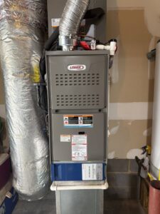 An indoor Lennox furnace and air handler unit installed by Eveready Service Experts in Henrico, VA.