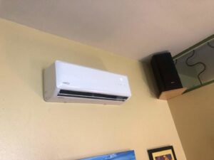 A white Lennox mini-split HVAC indoor unit installed on a wall by Butte Tin Shop, Inc. in Butte, MT.