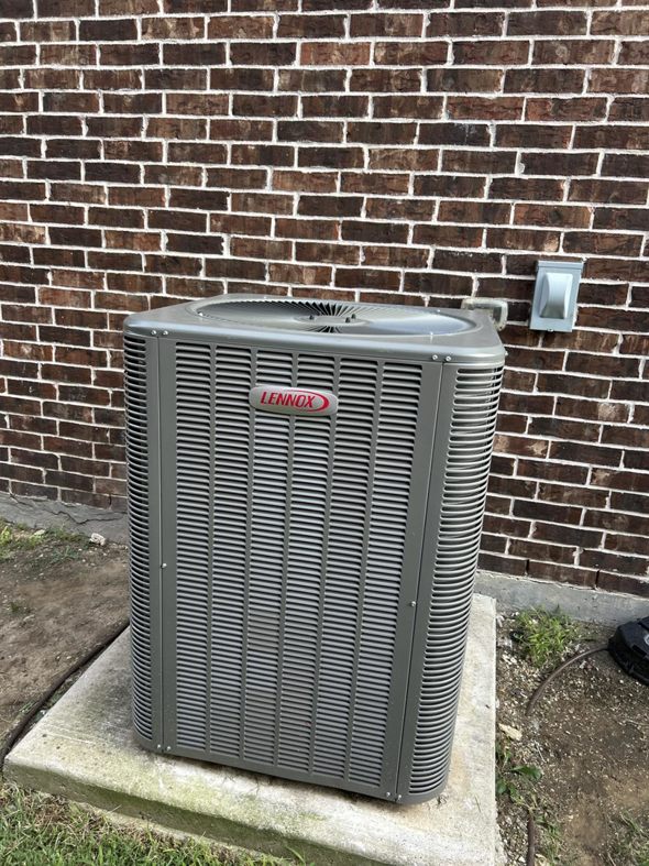 An outdoor Lennox air conditioning unit serviced by Sonnyreena Mechanical LLC in Garland, TX