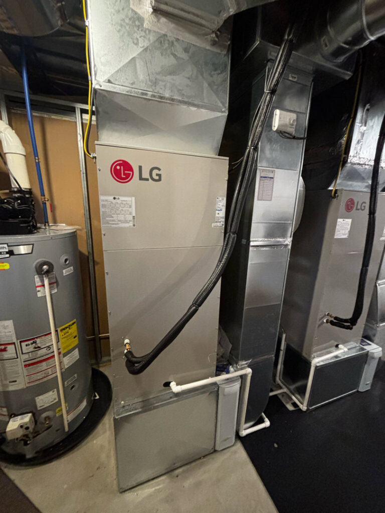 An LG HVAC air handler and associated ductwork installation inside a building by Aire Serv of Rochester, NY