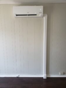 An LG mini-split indoor unit professionally installed on a wall by Tack Mechanical LLC in Baltimore, MD.
