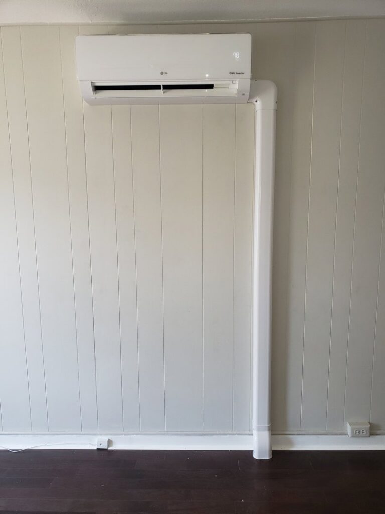 An LG mini-split indoor unit professionally installed on a wall by Tack Mechanical LLC in Baltimore, MD.