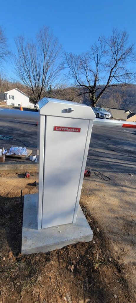A LiftMaster barrier arm gate operator installed by Universal Overhead And Garage Doors in Baltimore, MD.