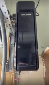 A close-up of a newly installed black LiftMaster garage door opener by Align Garage Door in Ringgold, GA.