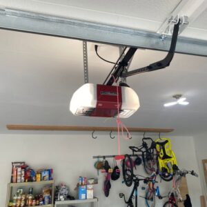 A LiftMaster garage door opener installed in a residential garage by The Region's Garage Door Repair in Hammond, IN.