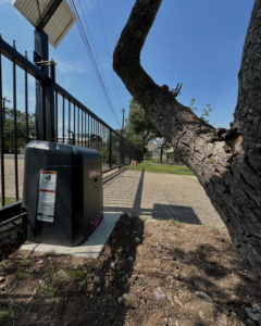 A close-up of a LiftMaster gate opener motor installed for a custom gate by Down South Welding and Fabrication in Canyon Lake, TX.