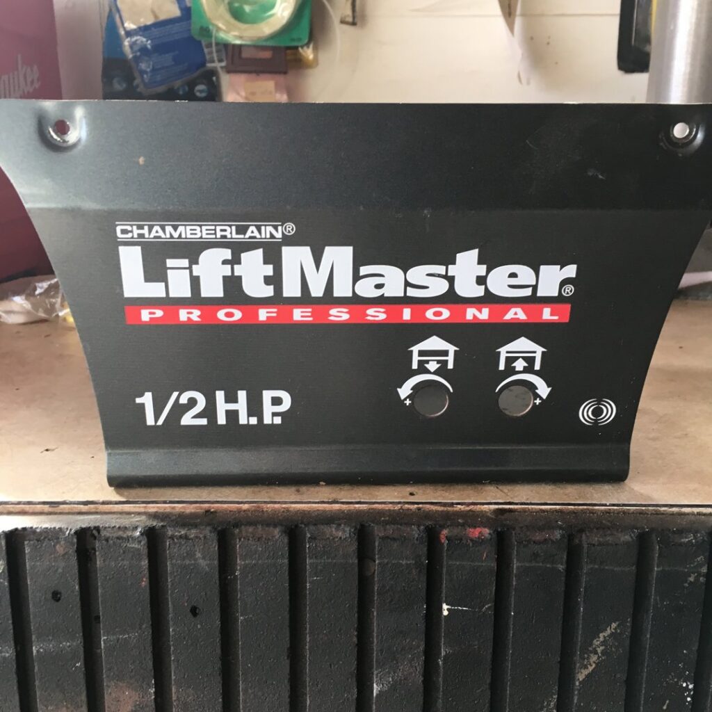 A close-up of a LiftMaster Professional 1/2 H.P. garage door opener control panel, serviced by Tri County Overhead Door Service Inc in New London, WI