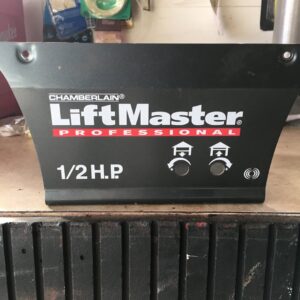 A close-up of a LiftMaster Professional 1/2 H.P. garage door opener control panel, serviced by Tri County Overhead Door Service Inc in New London, WI