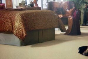 A bedroom with a soft light beige carpet installed by Floor Designs Unlimited, LLC in Pittsburgh, PA