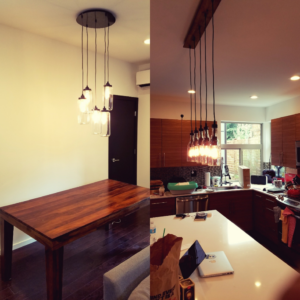 Modern pendant lighting installed over a kitchen island and dining table by Town Electric, Plumbing & Heating LLC in Seattle, WA