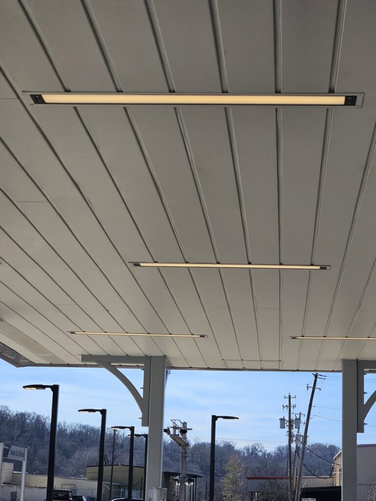 Linear LED lighting fixtures installed on a ceiling, showcasing commercial lighting work by Apex Electric LLC in Brea, CA.