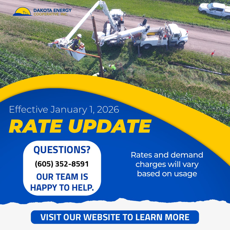 Lineworkers in bucket trucks repairing power lines in a rural area for Dakota Energy Cooperative in Huron, SD.