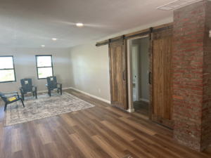 Spacious living area illuminated by recessed ceiling lights installed by Highmark Electric in Kearney, NE.
