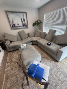 Living room area rug cleaning in progress with drying equipment by Tmz Magic Carpet Cleaning in West Hartford, CT.