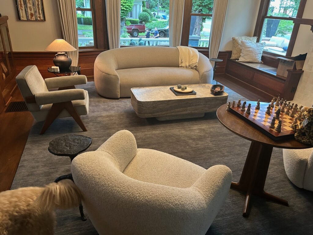 A modern living room featuring a large area rug, a service provided by Alameda Carpet & Upholstery Cleaners in Portland, OR.