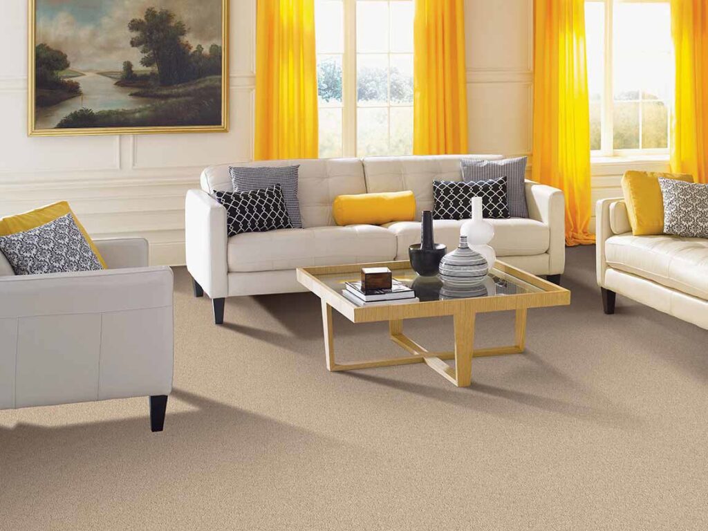 A beautifully carpeted living room with beige carpet installed by Pape's Flooring America in Pittsburgh, PA