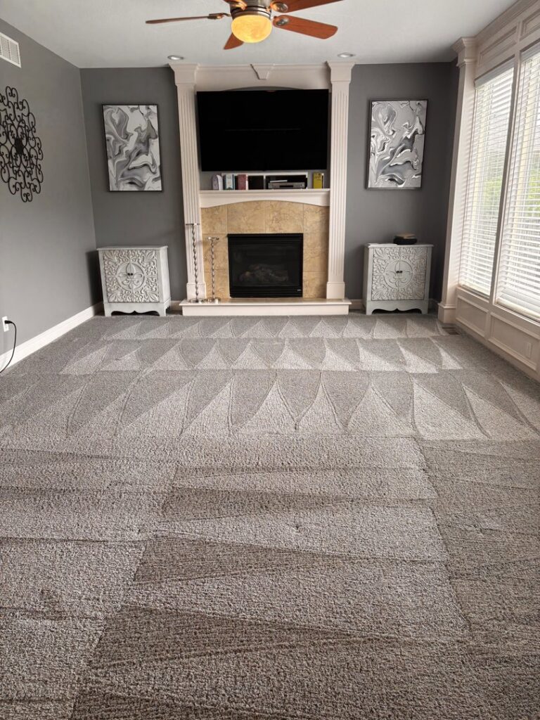 A living room carpet showing clean lines and patterns after professional cleaning by R&W Carpet Cleaning & Water Extraction in Independence, MO.