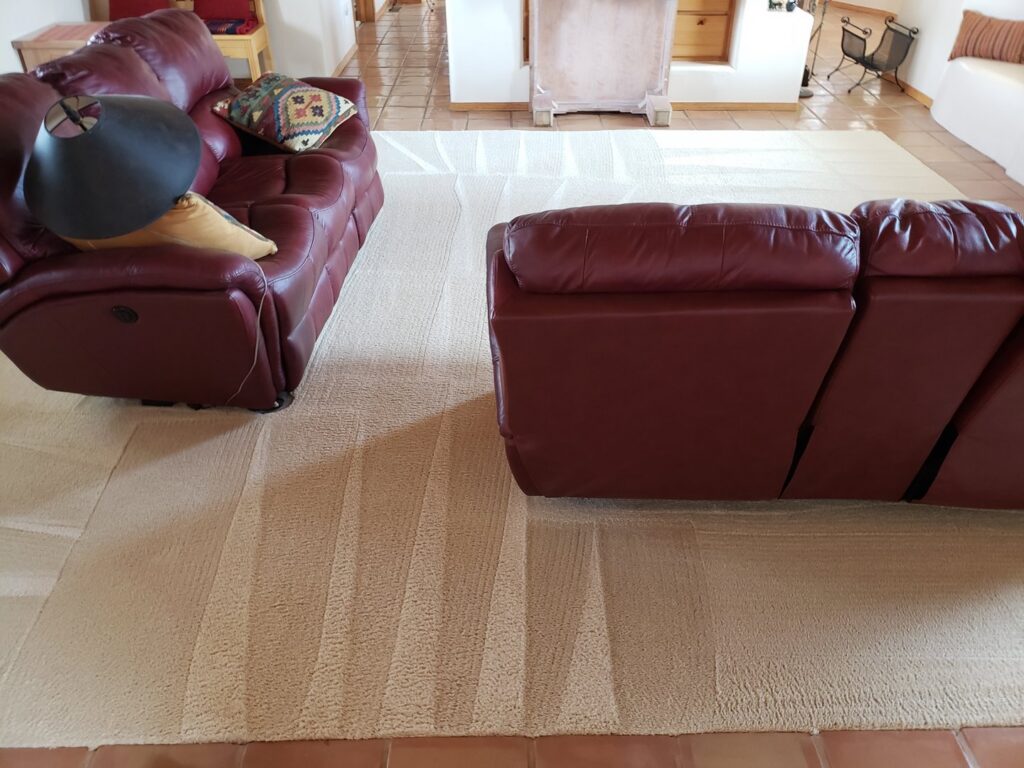 A living room carpet with distinct cleaning lines after professional service by Steamaway Carpet Cleaning in Albuquerque, NM.