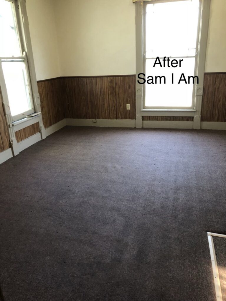 A clean, patterned carpet in a living room after professional cleaning by Sam I Am Carpet Cleaning in Rossville, IN
