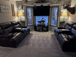 A living room with a freshly cleaned carpet showing distinct lines by Rent A Vet Carpet Cleaning in St. Charles, MO.