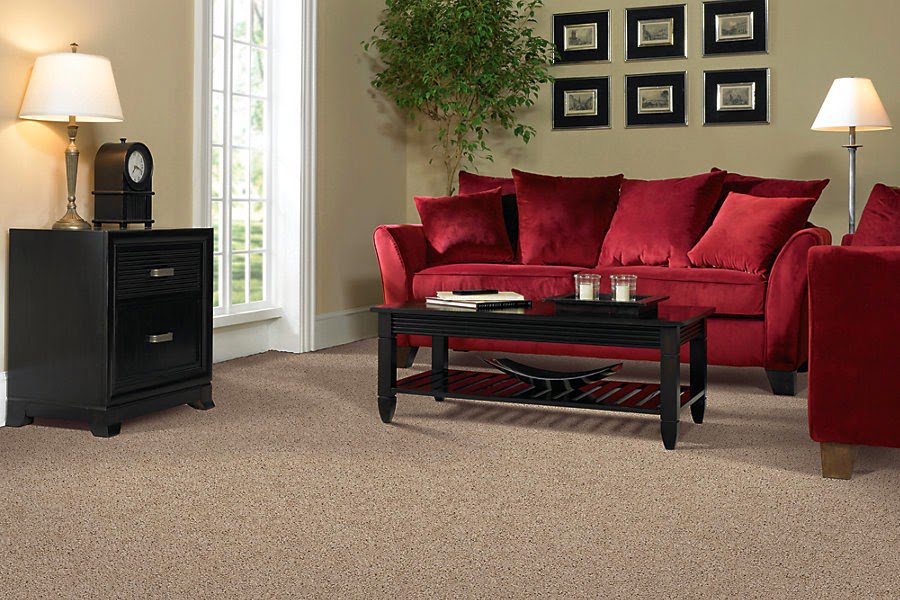 A cozy living room featuring a new light brown carpet installation by CR Flooring in Atlanta, GA