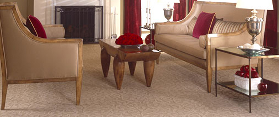 A beautifully installed patterned carpet in a living room by Floor Gallery in Pearland, TX