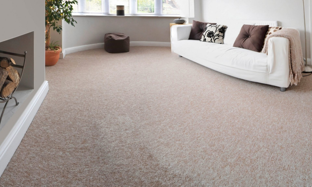 A newly installed light-colored carpet in a living room by Future Floors Omaha in Omaha, NE.