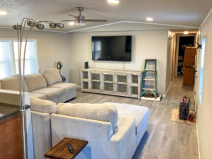 Living room with a newly installed ceiling fan by Green Monarch Construction in Sioux Falls, SD