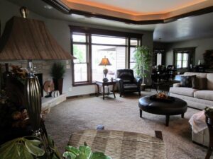 A beautifully decorated living room featuring newly installed carpet by Eatherton's Fashion Floors in St. Louis, MO.