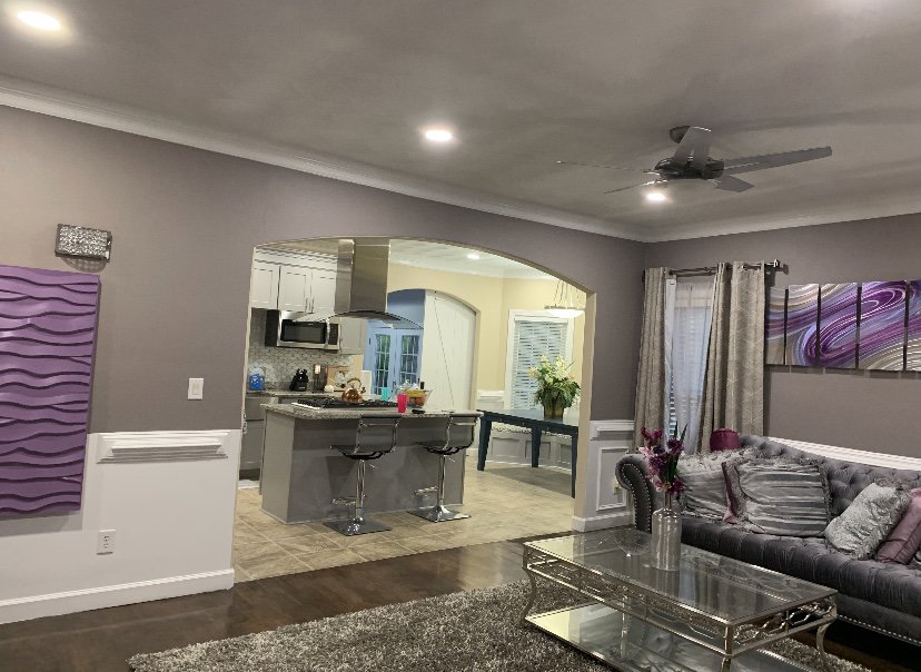 Living room and kitchen with new recessed lighting and ceiling fan by Fresh Start Electrical, LLC in Newport News, VA